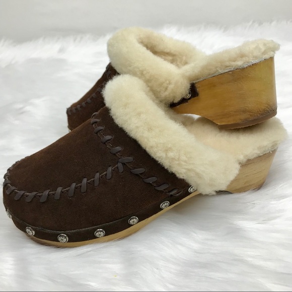 fur lined wooden clogs